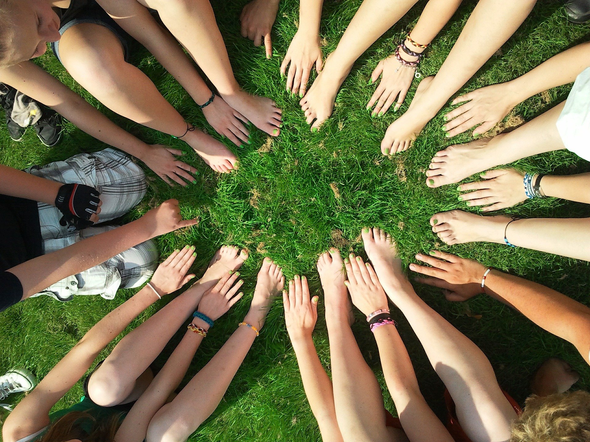 A group of hands in a circle
